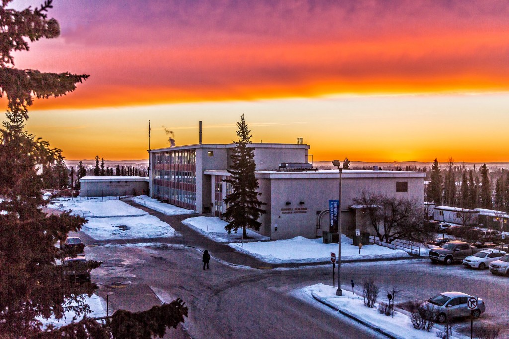 A brilliant sunrise brightens the sky southeast of the Bunnell Building on the Fairbanks campus at about 9:15 a.m. on Wednesday, Feb. 5. 