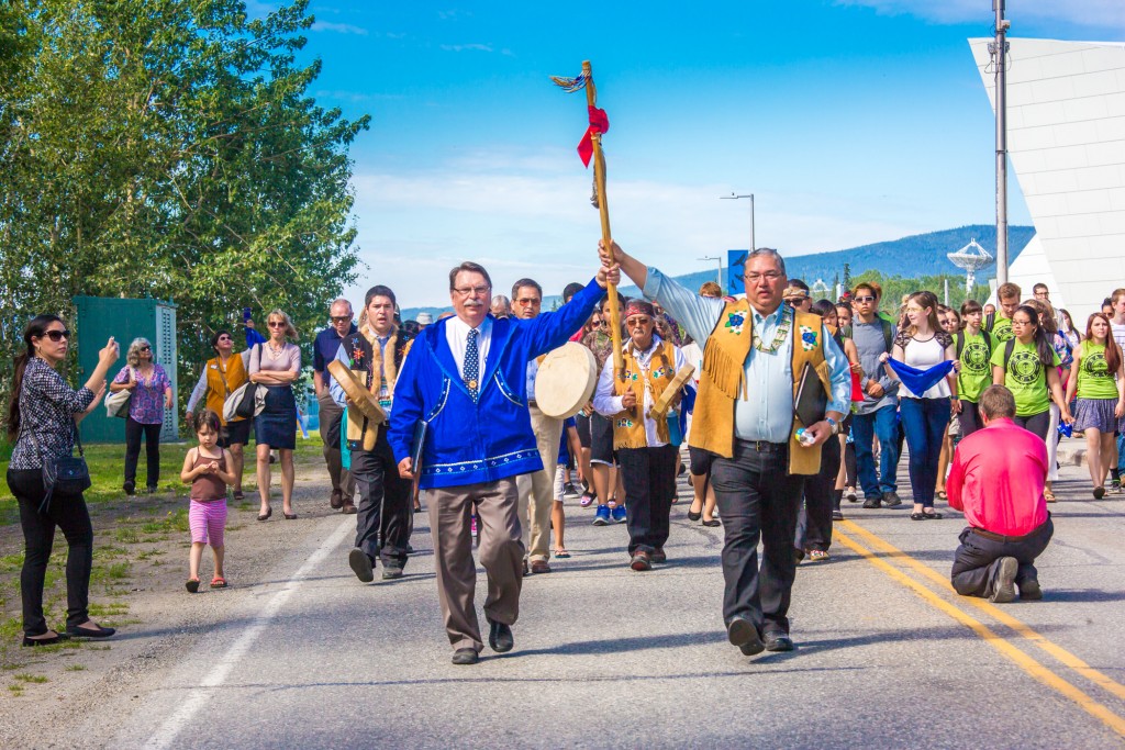 Chancellor Brian Rogers and Tanana Chiefs President Victor Joseph lead a procession down Yukon Drive during Monday's dedication ceremony on the UAF campus. The parade led from a ceremony on Troth Yeddha' hill near the University of Alaska Museum of the North to Cornerstone Plaza for the formal rededication of the Cornerstone originally laid 100 years ago this week by Territorial Judge James Wickersham. 