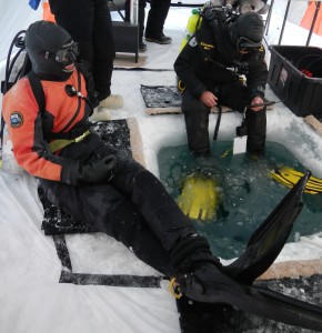 Photo by Lorena Edenfield. Brenda Konar and Rob Robbins prepare for an under ice dive March 1 near Barrow.