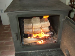 Biomass briquettes made in Petersburg burn. A representative of the Alaska Center for Energy and Power will talk about the use of biomass in homes and communities.