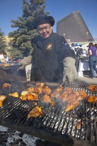UAF Dining Services employee Art Roberts keeps a steady supply of chicken coming during the SpringFest barbecue on the Fairbanks campus. UAF photo by Todd Paris.