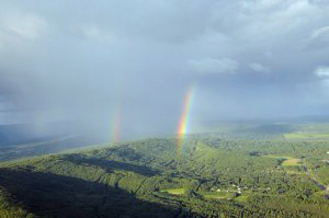 J. Shaw photo. Double rainbow over the hills north of Fairbanks, Alaska.