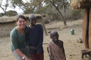 Photo by Jessica Beltman. Adrina Knutson with Maasai children in Tanzania.