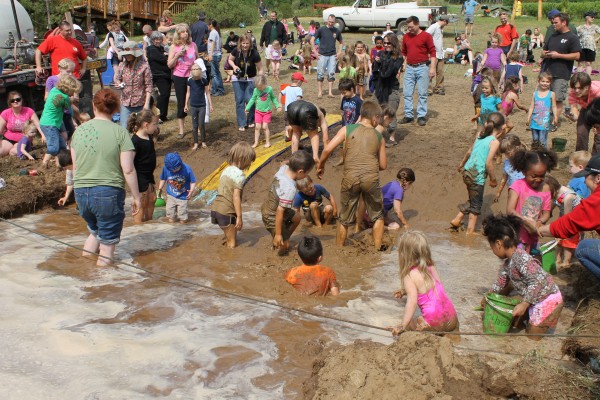 Children relished playing in the mud at last year's Mud Day at Georgeson Botanical Garden.