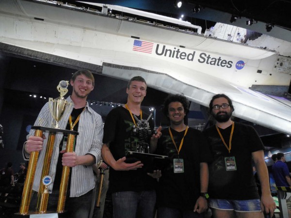 Photo courtesy Orion Lawlor. Members of the UAF robotics team pose with their Judge's Innovation Award trophy earned at the 2014 NASA Robotic Mining Competition at the Kennedy Space Center in Florida on May 23. From left are Tyler Pruce, Dalton Newbrough, Arsh Chauhan and John Pender.