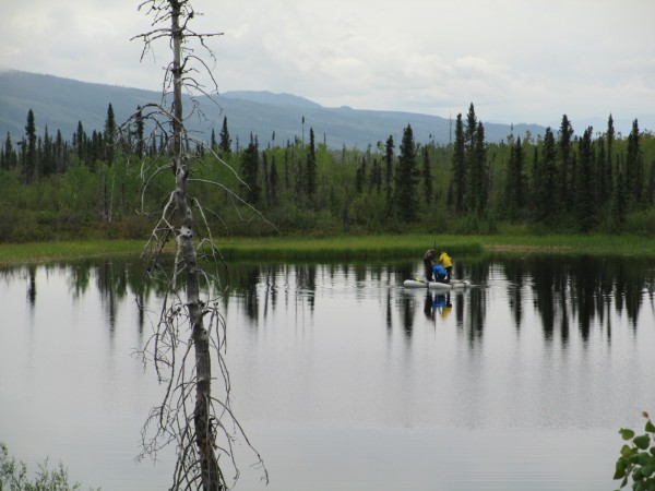 Researchers take samples from arctic lakes in Alaska to see what the lakes were like more than 7,500 years ago durning a period of warming climate. Photo by Hannah Laurens.