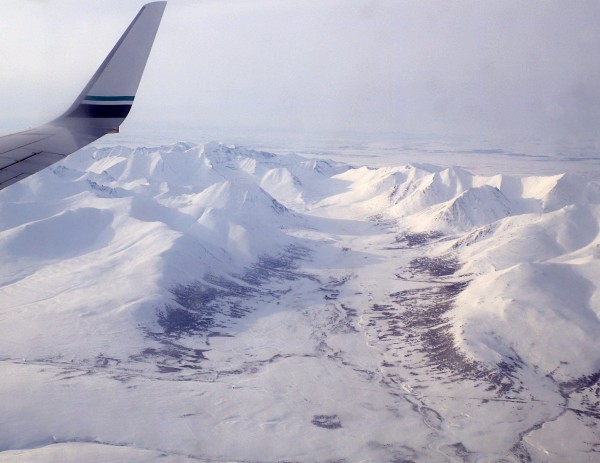 Ned Rozell photo. A window-seat view of the Grand Central River valley, within the Kigluaik Mountains north of Nome. Ned Rozell and his friends would ski the road (visible at bottom) on the last day of a trip from Shishmaref to Nome.