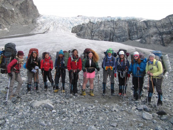 The nine girls in Girls on Ice and one of their instructors pose for a group shot in front of the glacier that they were studying. Many of the girls said the program was about more than science - it enabled them to make life-long friends and develop an appreciation in their own abilities. Photo courtesy of Girls on Ice.