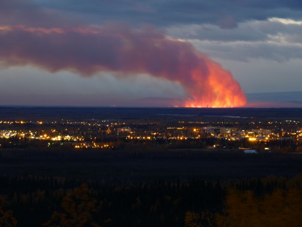 Photo courtesy Geophysical Institute.  A smoke plume rises from the 2012 Dry Creek Fire, as seen from UAF’s West Ridge.