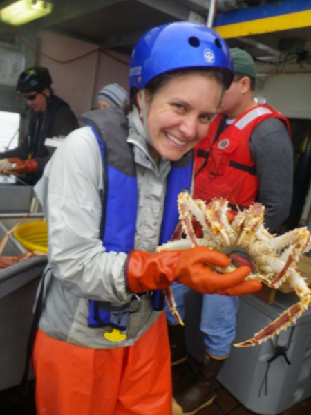 Photo by Katie Palof. Leah Sloan holds up an infected king crab.