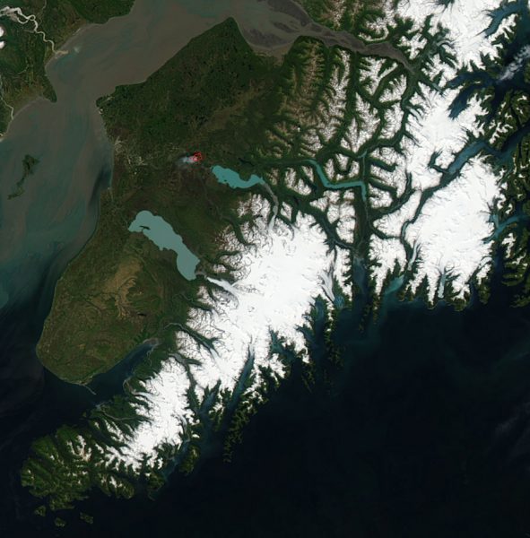 This image of the Kenai Peninsula on June 15, 2015, was acquired from the Moderate Resolution Imaging Spectroradiometer aboard the Aqua satellite. The red box in this cropped image denotes a wildfire.