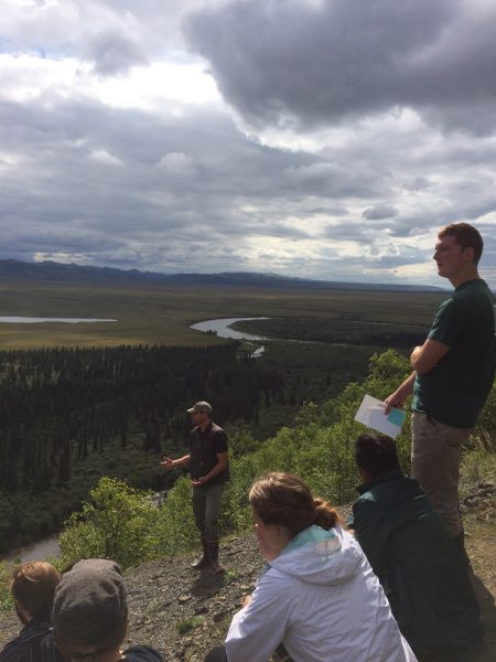Photo courtesy of Sam Norlin, REACH Up. Bering Strait School District teachers gather on a bluff above the Unalakleet River to learn about the waterway's history and hydrology in August 2016.