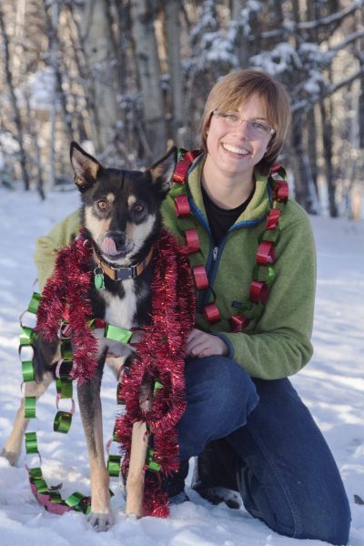Photo by Meghan Murphy. Bring your pet to the UAF veterinary students' fundraiser for a holiday photo, modeled here by geology student Kailyn Davis and her dog Zeke.
