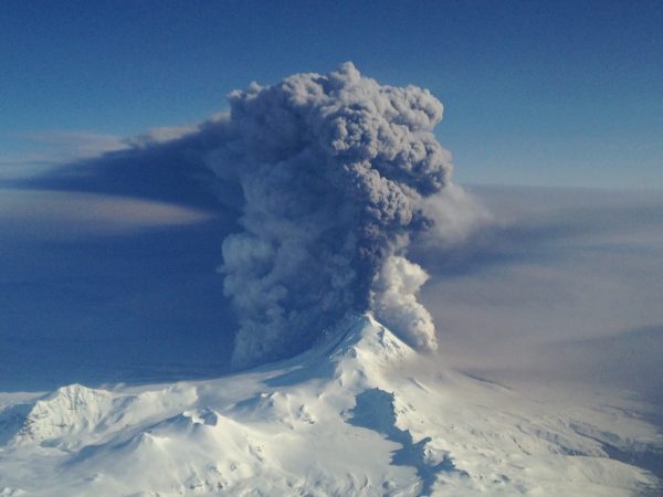Photo by U.S. Coast Guard Lt. Cmdr. Nahshon Almandmoss. Pavlof volcano erupts on March 28, 2016. The photo was taken looking northeast from a Coast Guard Hercules aircraft at 20,000 feet.
