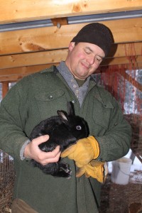 Photo by Nancy Tarnai.  Darren Demattio enjoys raising rabbits as much as reindeer. He said they are an excellent homesteader animal.