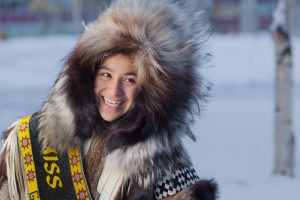 Marjorie Tahbone, an Alaska Native Studies major from Nome, wears her handmade parka outside the Brooks Building. Tahbone is enjoying her year as Miss Indian World for 2012.