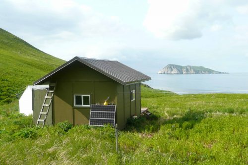 <i>Photo by Erik Andersen, U.S. Fish and Wildlife Service</i><br>This cabin on Chowiet Island, south of the Alaska Peninsula, is the summer home for two biologists who were the closest humans to a recent magnitude 8.2 earthquake. 